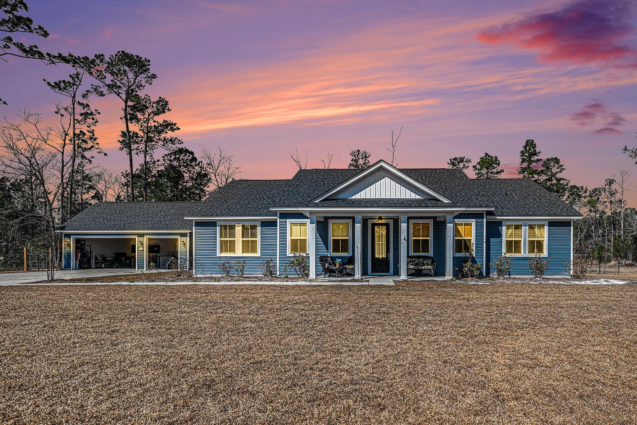 119 Clark Lane at dusk, porch lights on