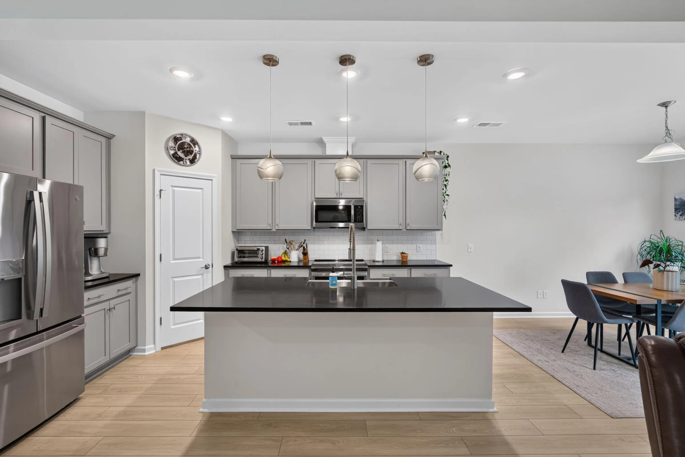 The kitchen's island and pendant lighting at 201 Palfrey Drive